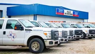A fleet of HVAC repair trucks ready to assist the next customer